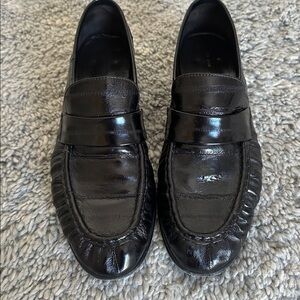 The Row black loafers